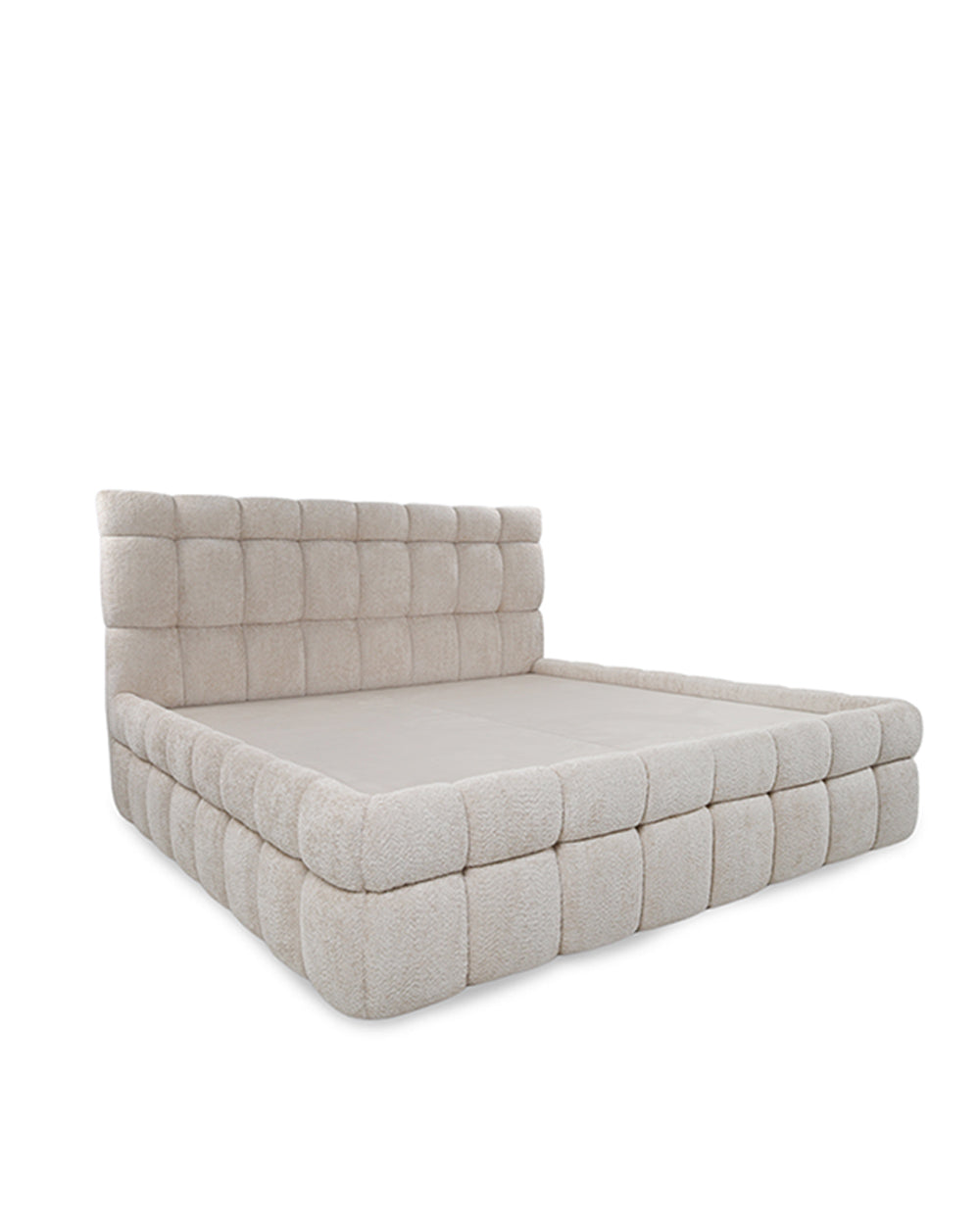 Beige upholstered bed with quilted design on a white background