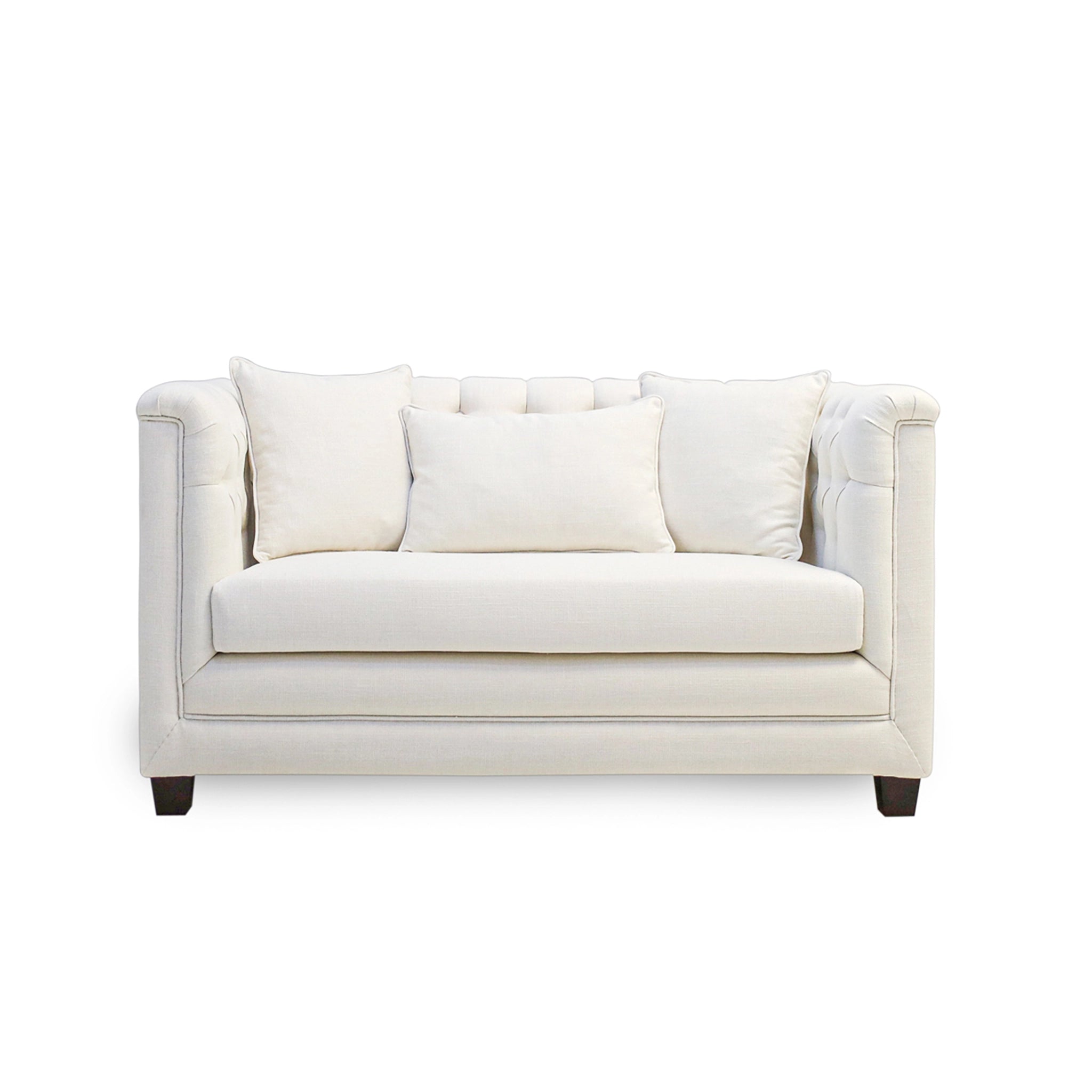 White sofa with three cushions on a white background