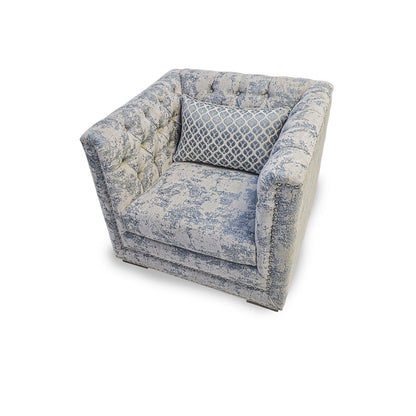Decorative armchair with blue and white pattern on a white background
