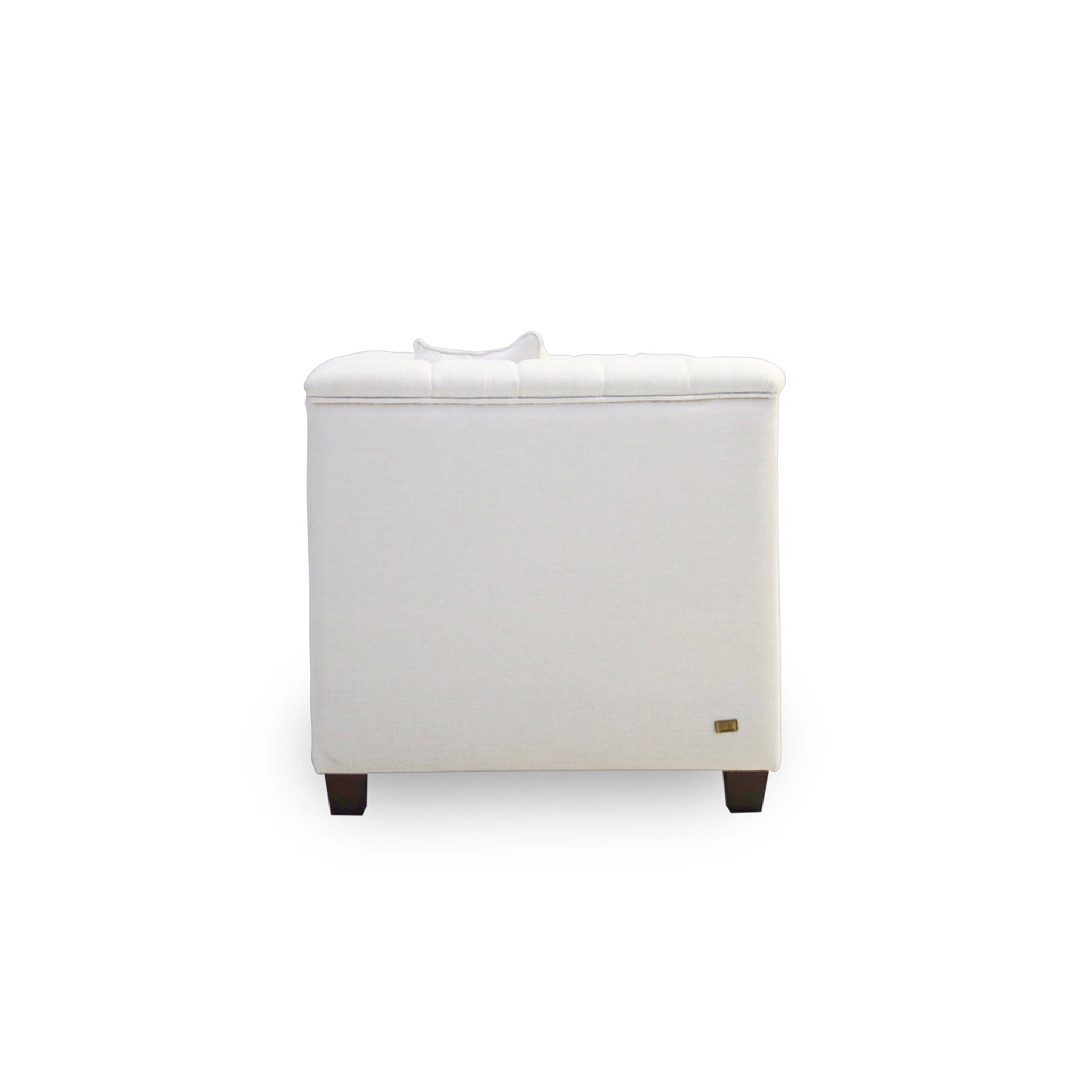 White ottoman with a small logo on a white background