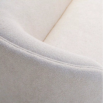 Close-up of a textured fabric surface with a subtle pattern.