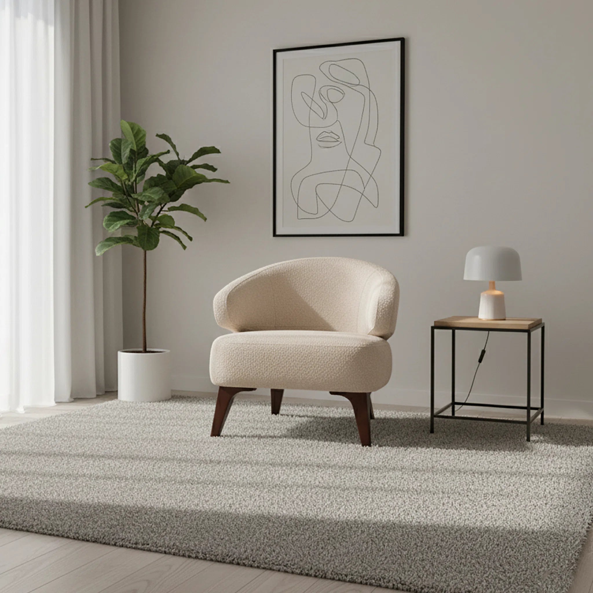 Beige armchair in a modern living room with abstract art and a plant.