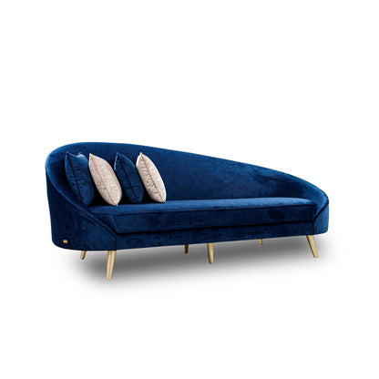 Blue velvet sofa with beige cushions on a white background
