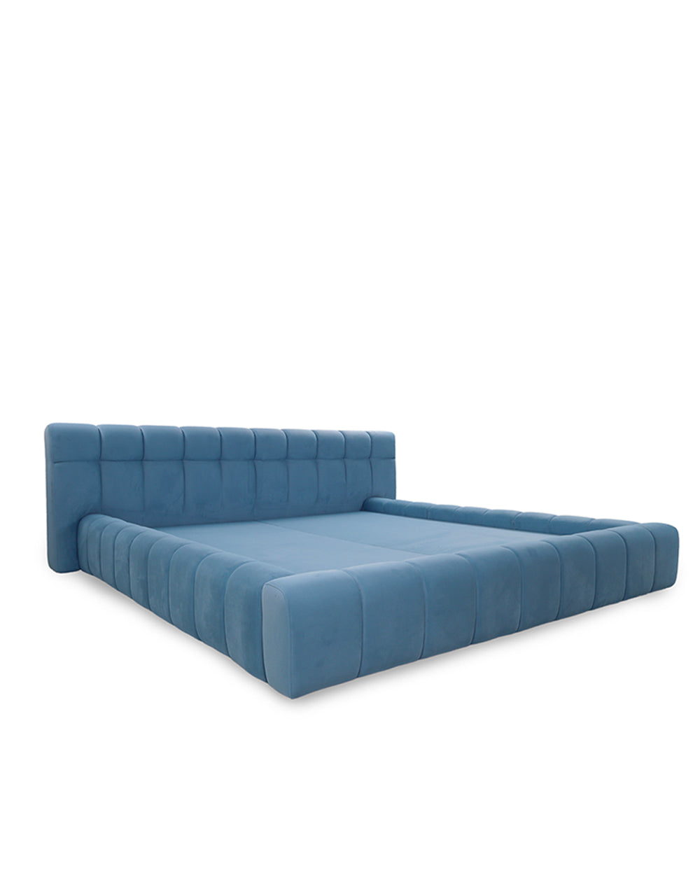 Blue tufted bed on a white background