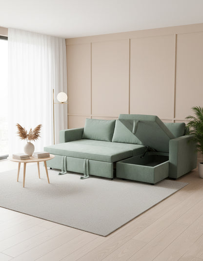 Green sofa bed in a modern living room with light wood flooring and white walls.