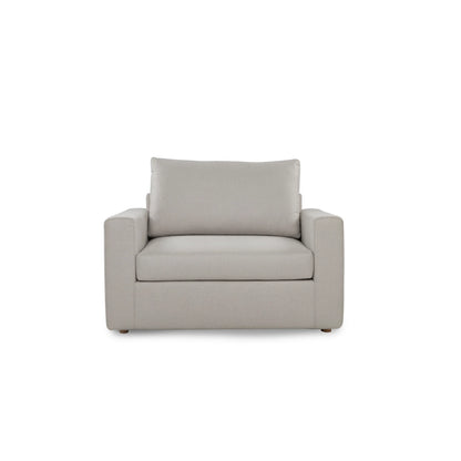 Gray armchair with a pillow on a white background