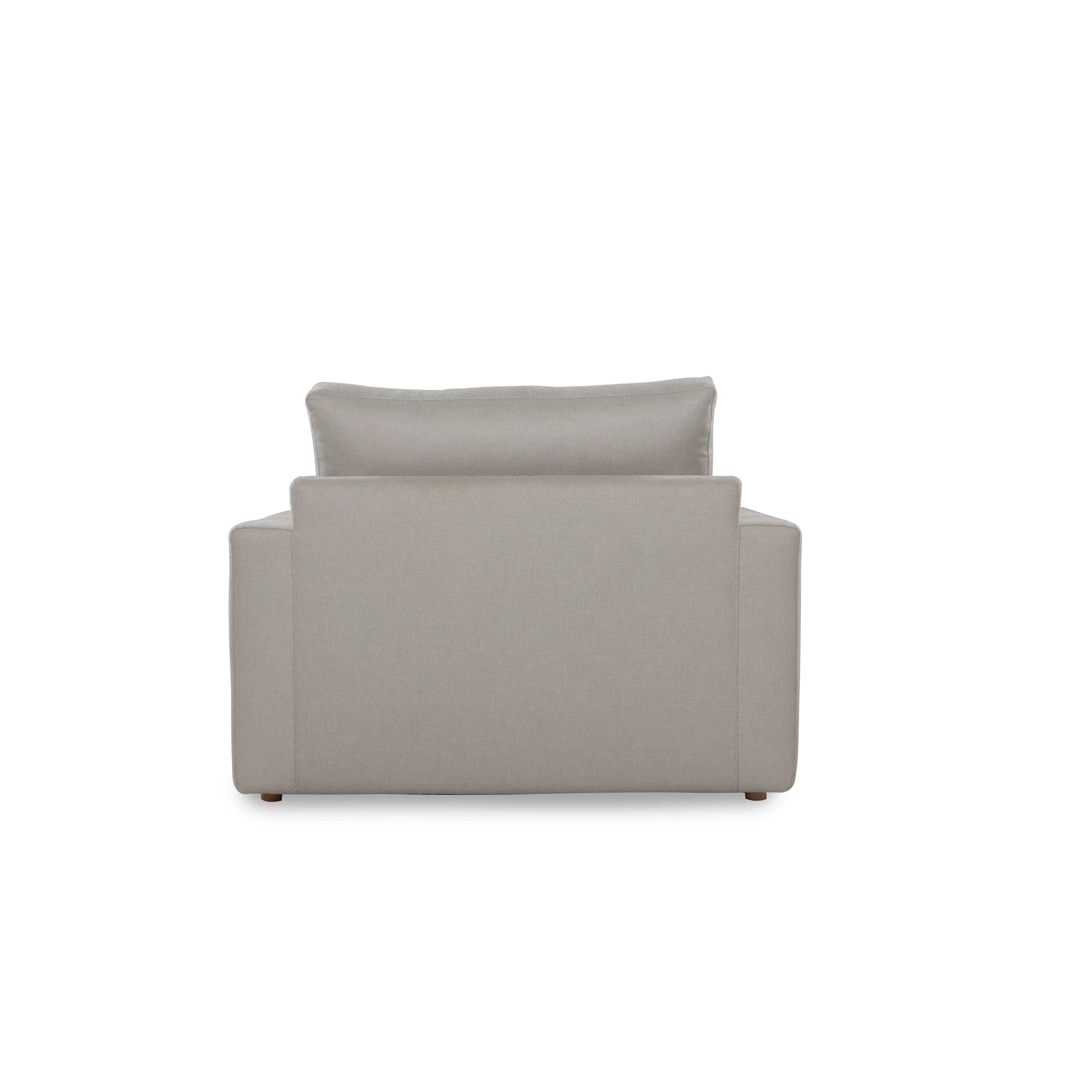 Gray armchair with a cushion on a white background