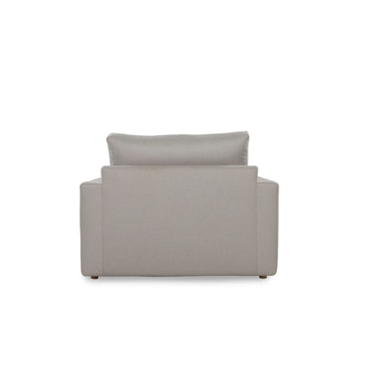 Gray armchair with a cushion on a white background