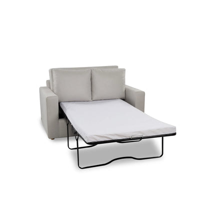 Gray sofa bed with a white mattress on a white background