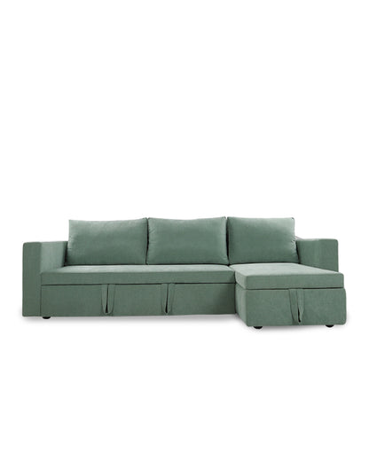Green sectional sofa on a white background