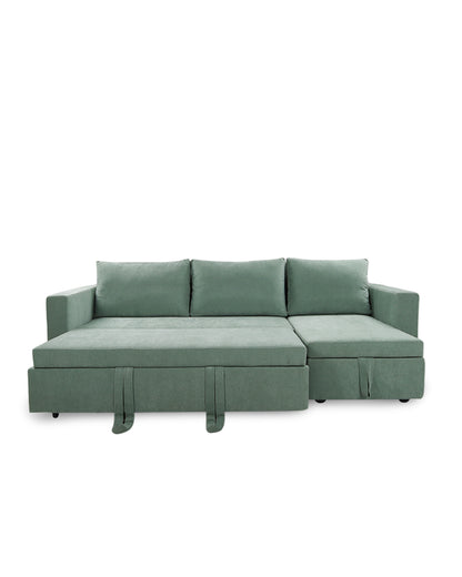 Green sectional sofa on a white background