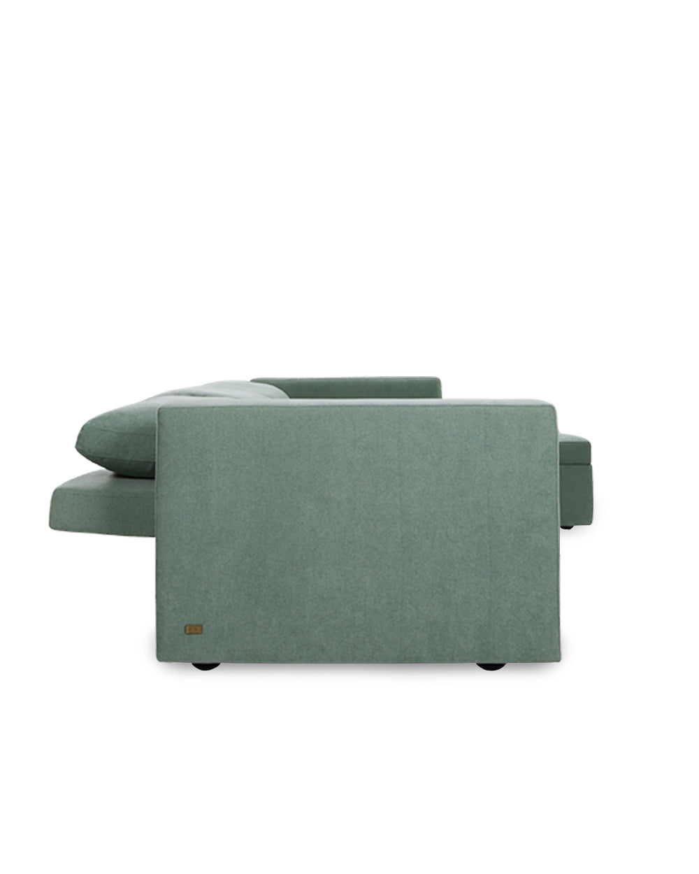 Green sectional sofa on a white background