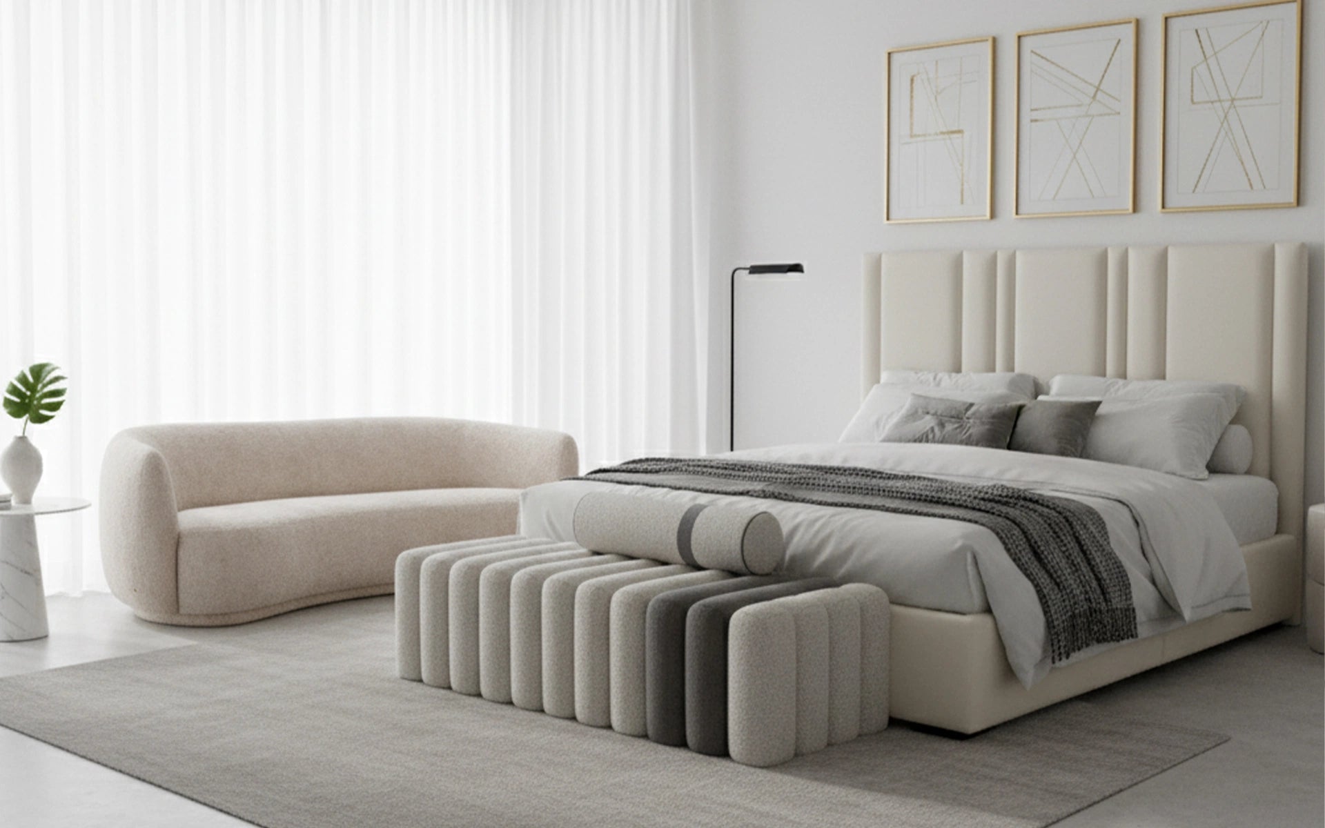 Modern bedroom with a bed, sofa, and abstract art on the wall.