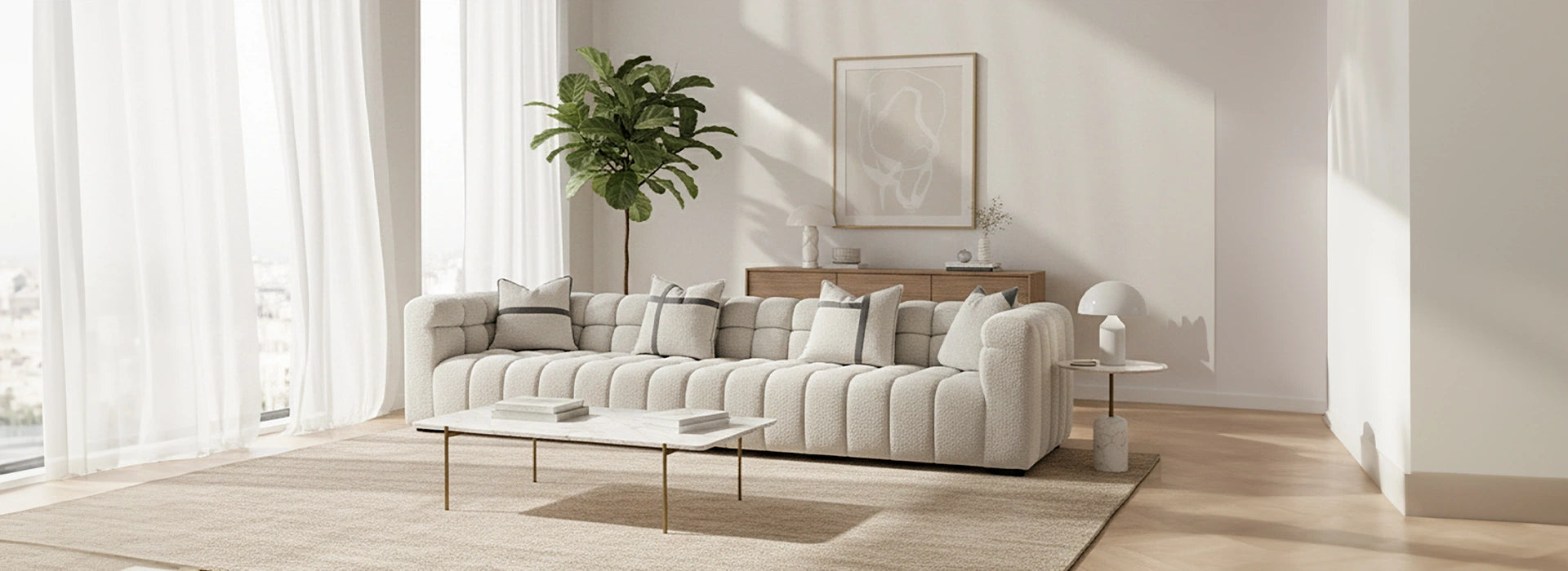 Modern living room with a white sofa, coffee table, and decorative items.